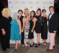 Walsh (far right) poses with board members of Wiggin' Out during a Wiggin Out Gala.